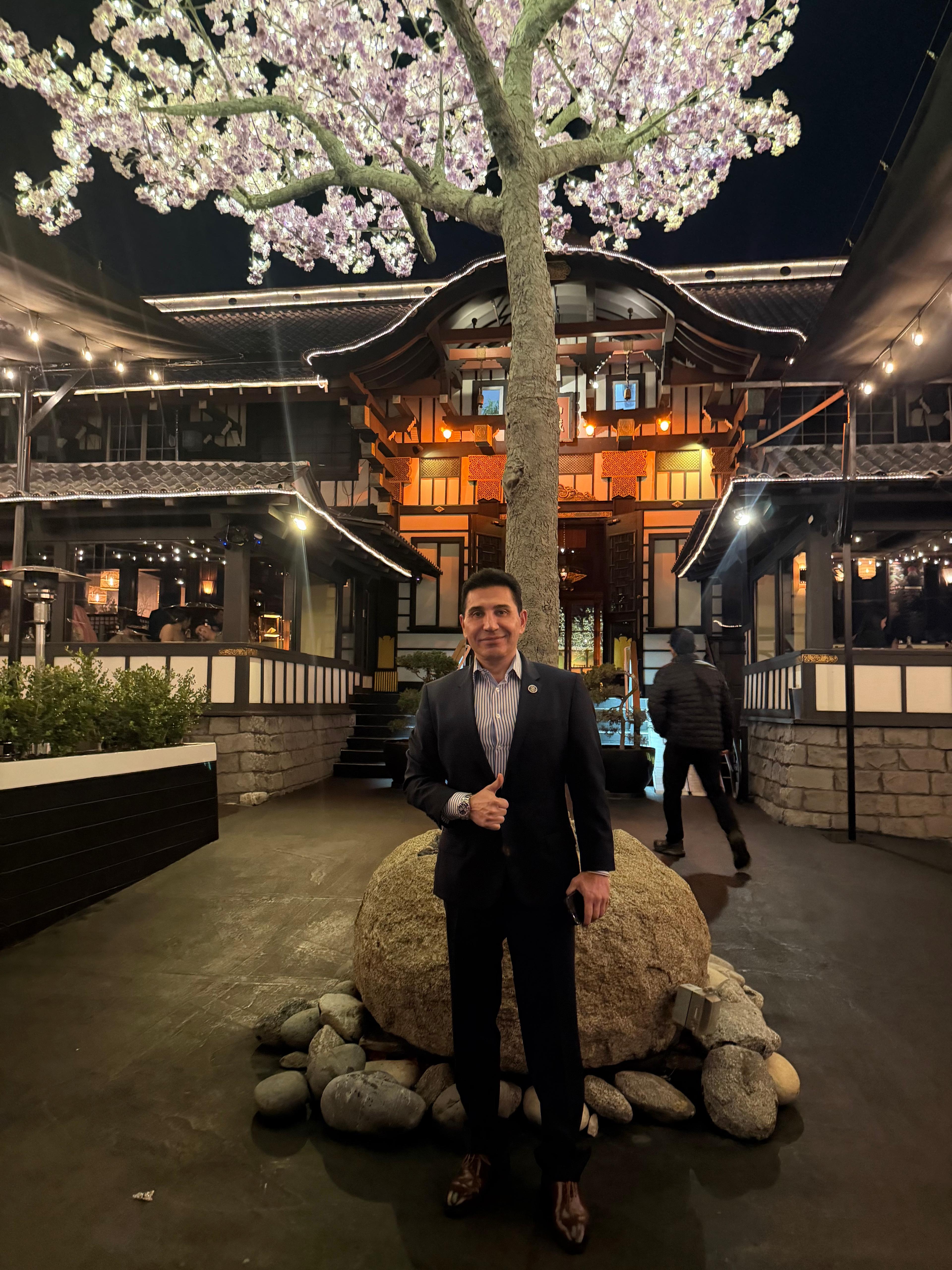 Fereidoun Khalilian at premium Japanese garden restaurant at night