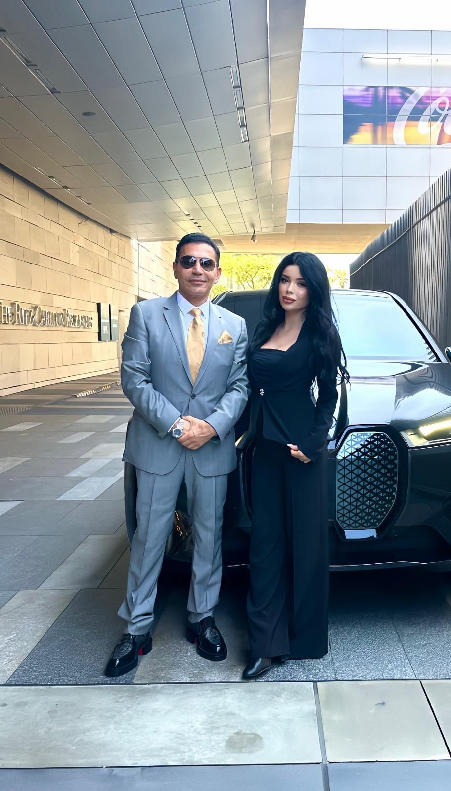 Fereidoun Khalilian at The Ritz-Carlton with luxury BMW — business lifestyle